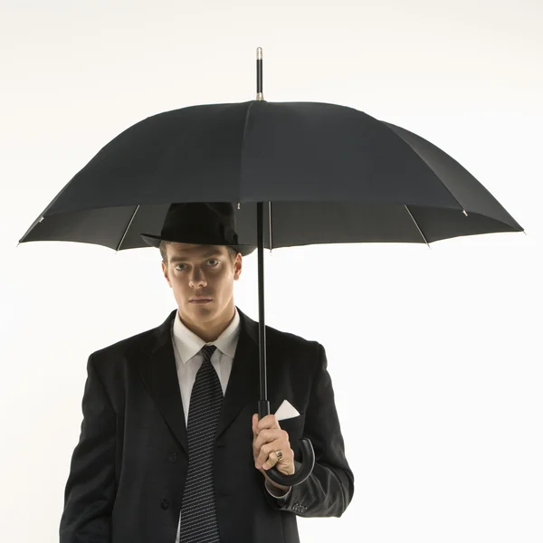 Empresário sob guarda-chuva . — Fotografia de Stock