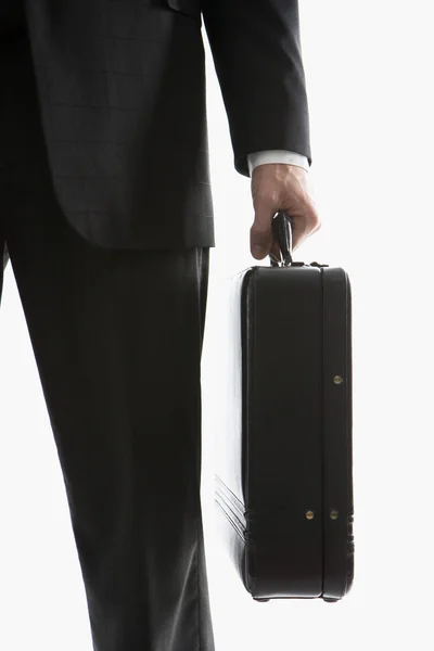 Businessman holding briefcase. — Stock Photo, Image