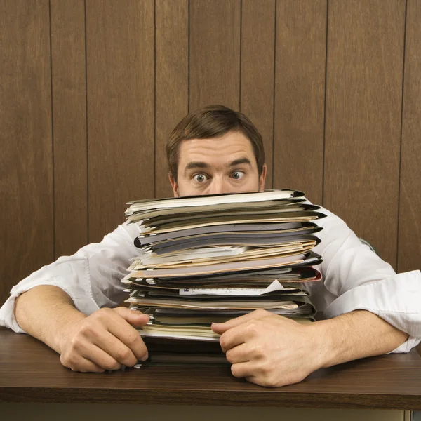 Man with heavy workload. — Stock Photo, Image