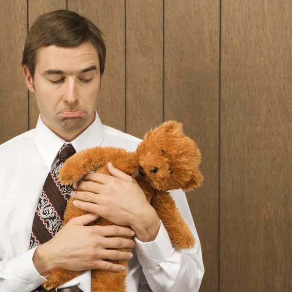 Man with teddy bear. — Stock Photo, Image
