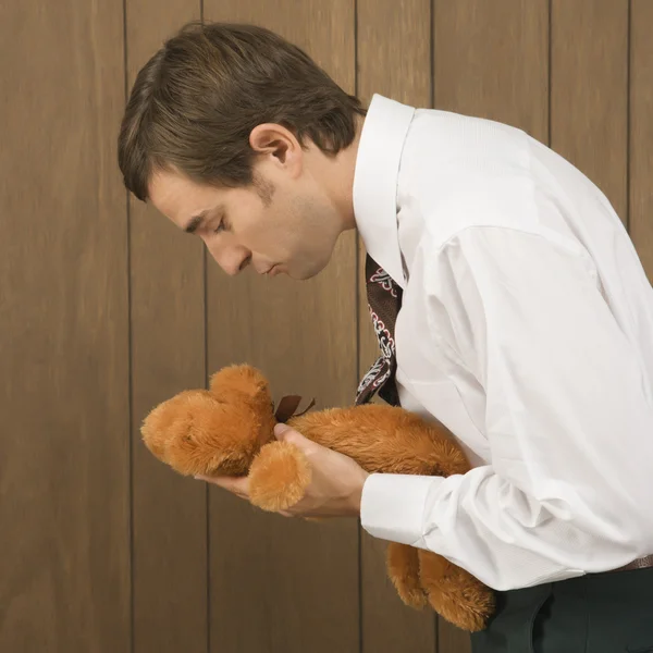 Man holding teddy bear. — Stock Photo, Image