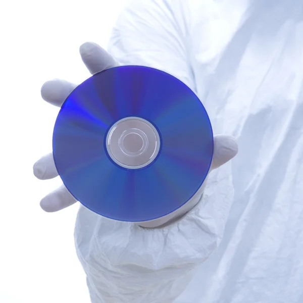 Biohazard homme tenant un disque . — Photo