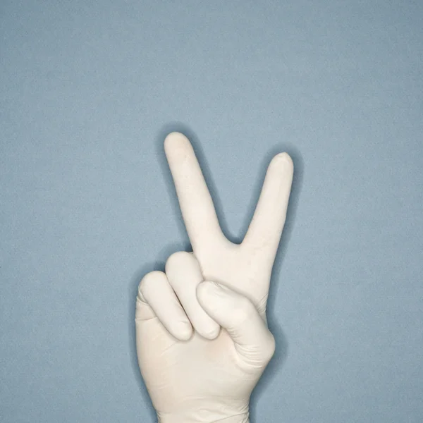 Hand giving peace sign. — Stock Photo, Image