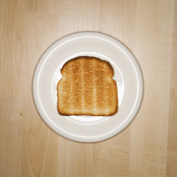 Slice of toast on plate. — Stock Photo, Image