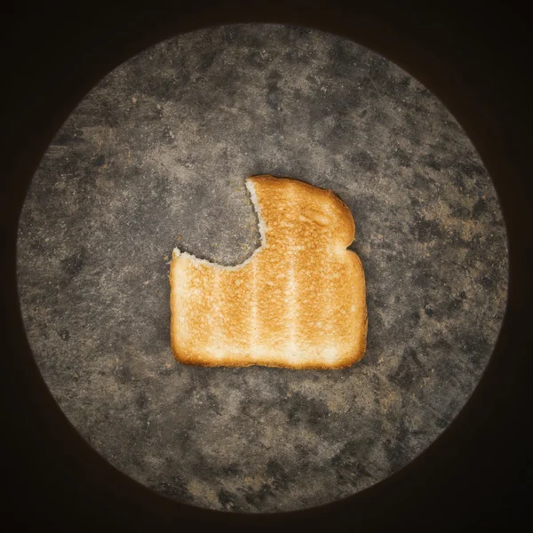 Toast with bite missing. — Stock Photo, Image