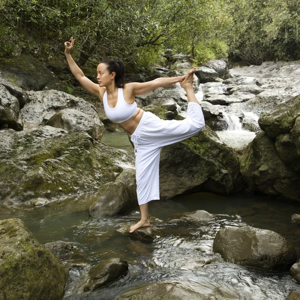 Asian woman doing yoga. — Stock Photo, Image
