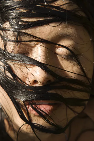 Womans face and wet hair. — Stock Photo, Image