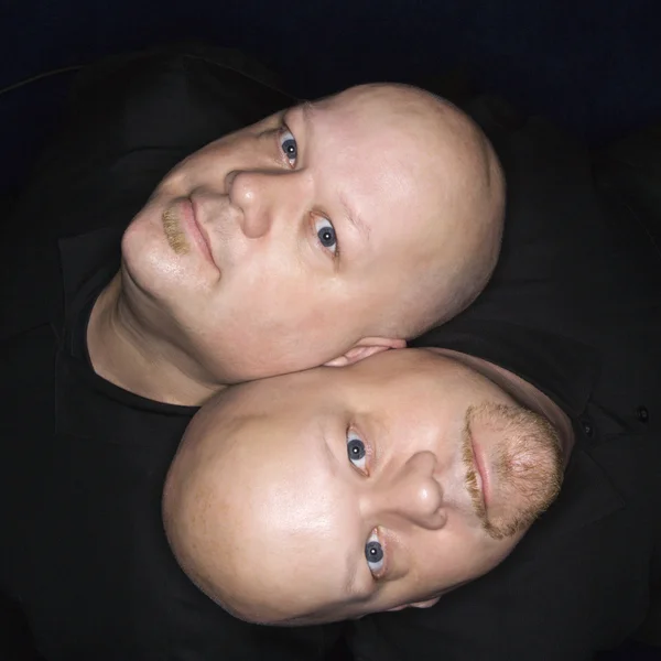 Twin skalliga män. — Stockfoto