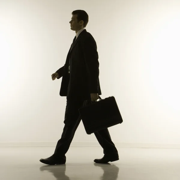 Empresário caminhando . Imagem De Stock