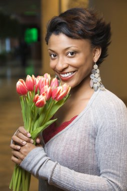 Portrait of Smiling Woman With Tulips clipart