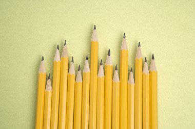 Pencils in uneven row. clipart