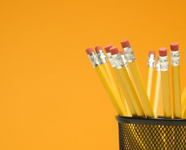 Pencils in holder. clipart