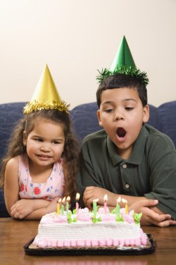 Kids having birthday party. clipart