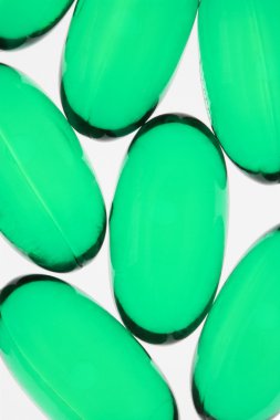 Green pill capsules. clipart