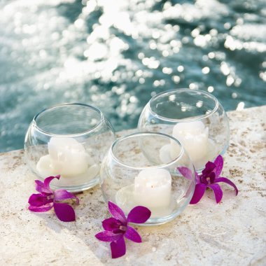 Orchids and candles. clipart