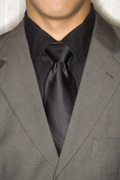Zakenman in pak en stropdas — Stockfoto
