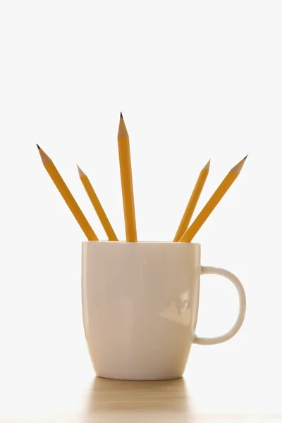 Pencils in coffee cup. — Stock Photo, Image
