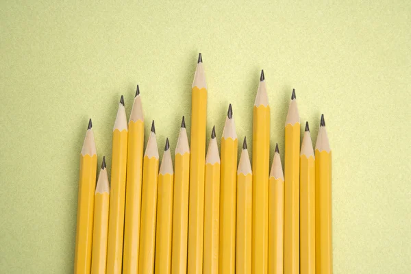 Pencils in uneven row. — Stock Photo, Image