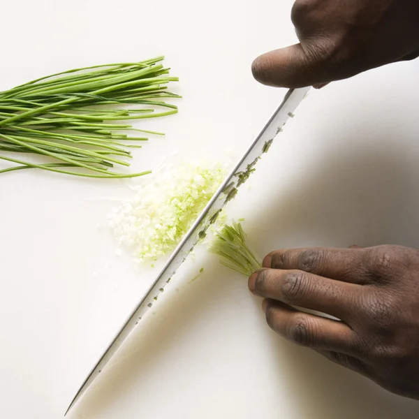 Knife chopping chives. — Stock Photo, Image