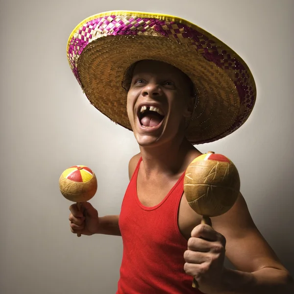 Mann mit Sombrero und Maracas. — Stockfoto