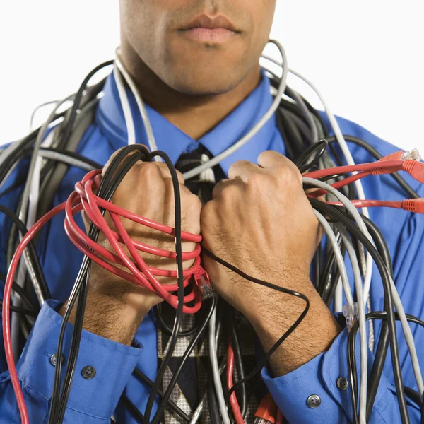 Man wrapped in cables. — Stock Photo, Image