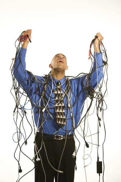 Hombre envuelto en cables . —  Fotos de Stock