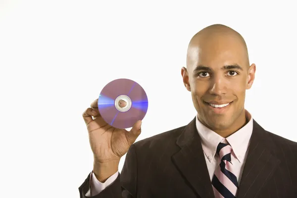 Uomo in possesso di compact disc . — Foto Stock
