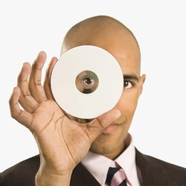 Людина тримає компакт-диск . — стокове фото