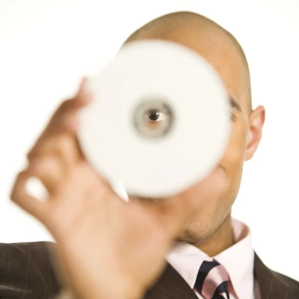 Muž hospodářství kompaktní disk. — Stock fotografie