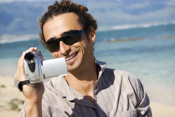 Man with video camera. — Stock Photo, Image