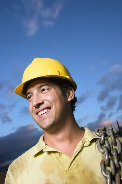 Pracownik budowlany uśmiechający się — Zdjęcie stockowe
