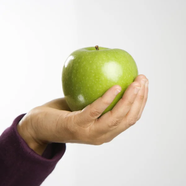 Hand bedrijf apple. — Stockfoto