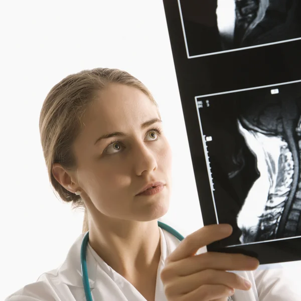 Doctor analyzing x-ray. — Stock Photo, Image