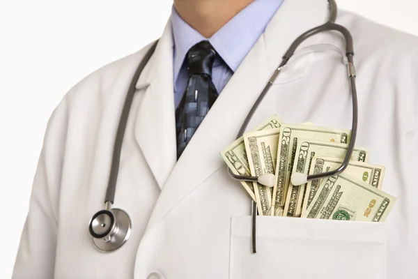 Doctor with cash. — Stock Photo, Image