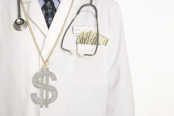 Doctor with cash. — Stock Photo, Image