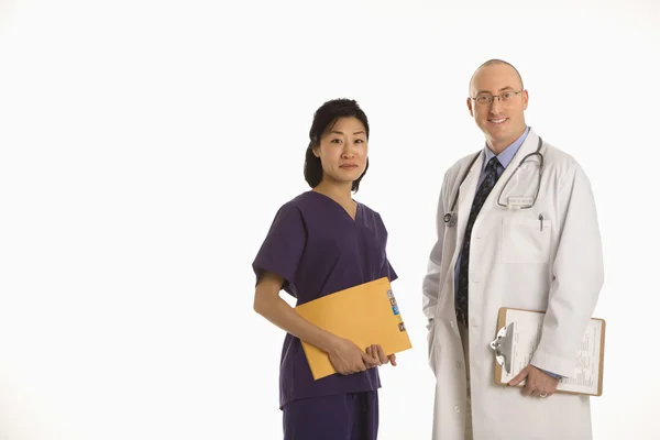 Man and woman doctors. — Stock Photo, Image