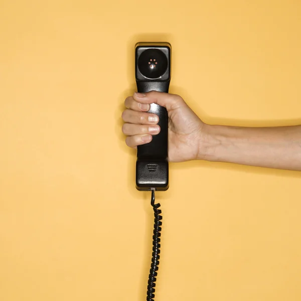 Hand met telefoon. — Stockfoto