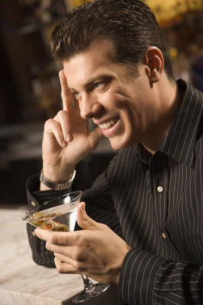 Man drinking martini. — Stock Photo, Image