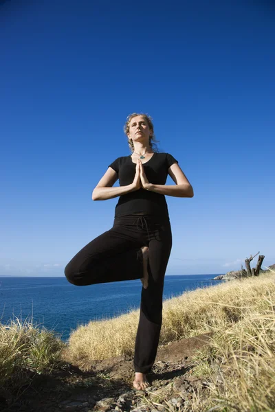 Woman practicing yoga. — Stock Photo, Image