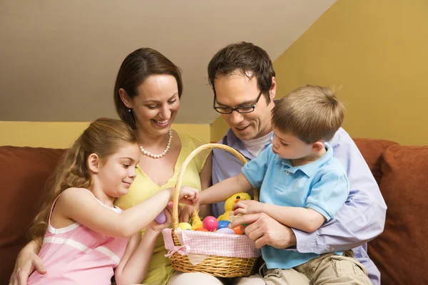 Family with Easter basket. — Stock Photo, Image