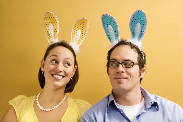 Couple wearing rabbit ears. — Stock Photo, Image
