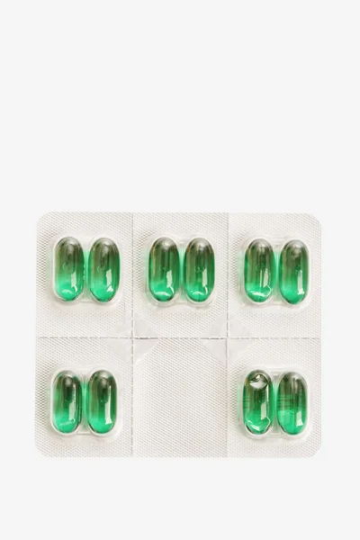 Pacote de pílulas de cápsula. Isolados — Fotografia de Stock