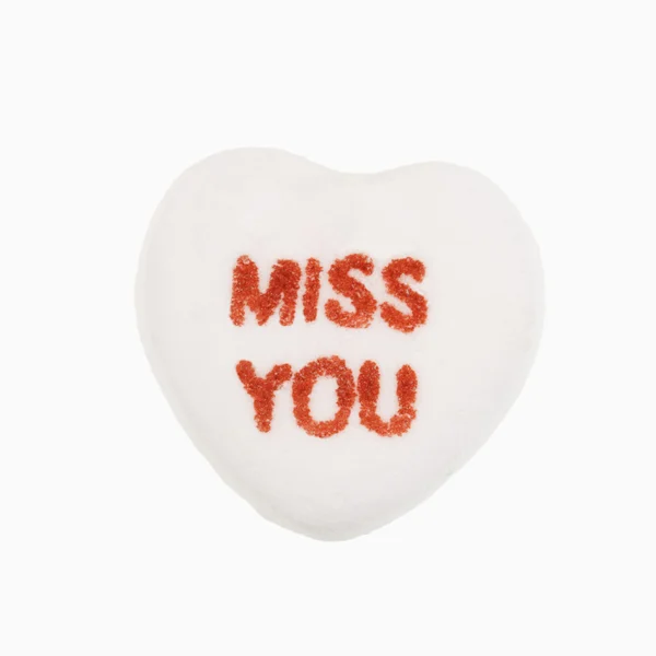 Candy heart on white. Royalty Free Stock Images