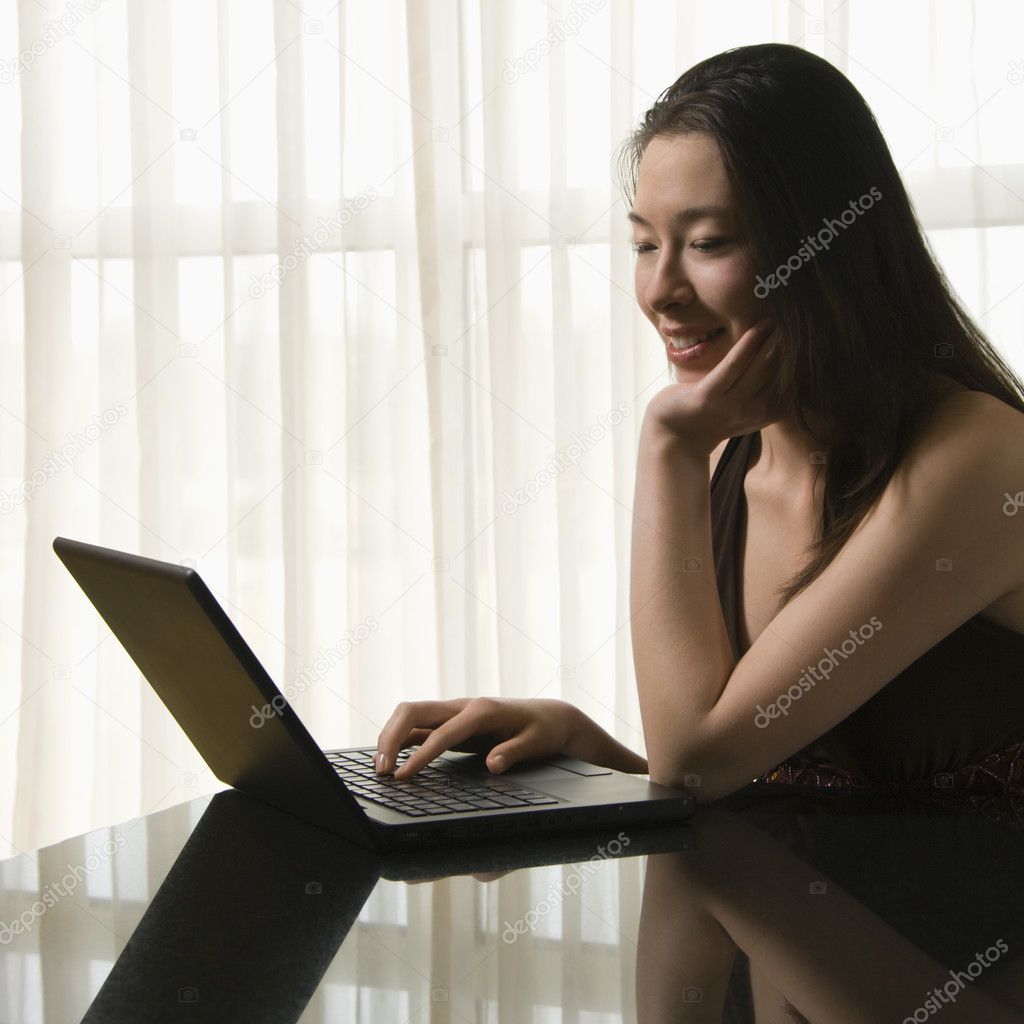 Woman on laptop.