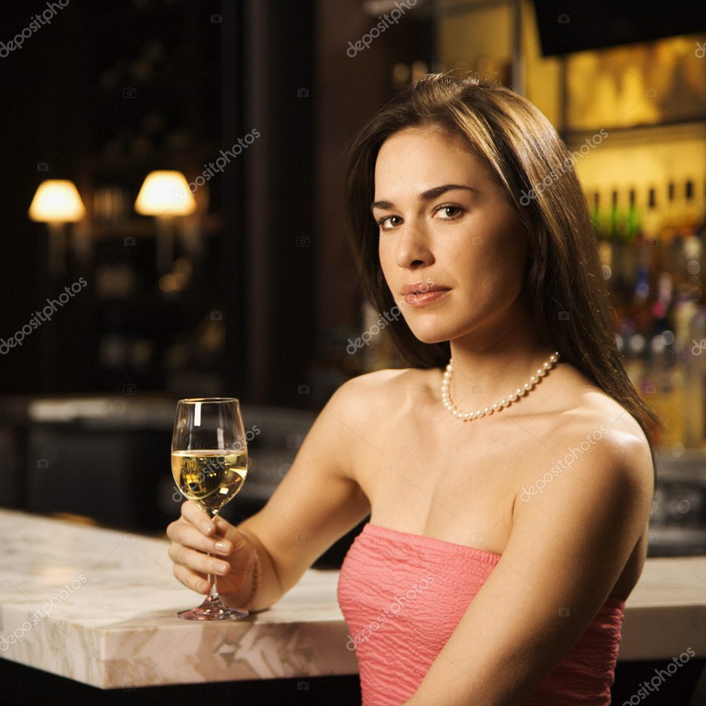 Woman drinking wine. — Stock Photo © iofoto #9553154