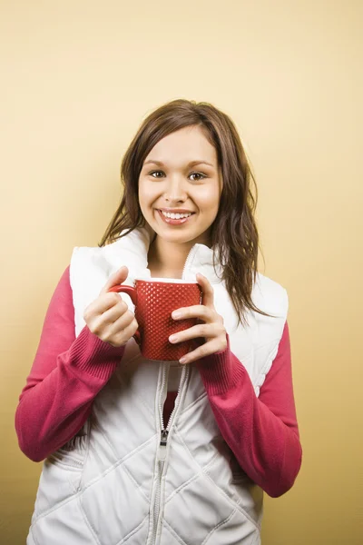 Woman holding cup. — Stock Photo, Image