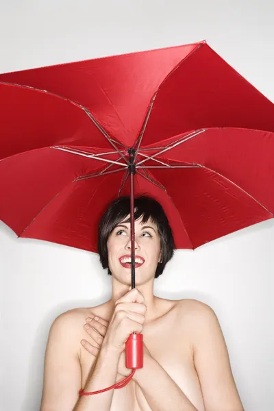 Sexy woman with umbrella. — Stock Photo, Image