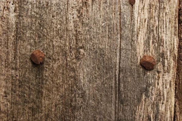 Altes Holzbrett, rostige Nägel — Stockfoto