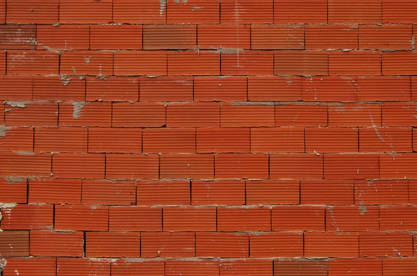Rød, ny mursteinsmur – stockfoto