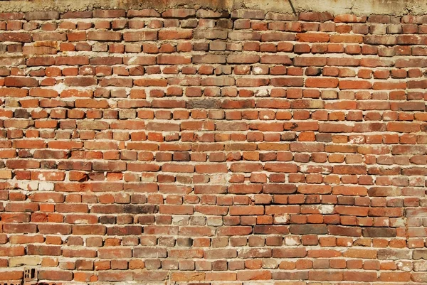 Niet-gepleisterd bakstenen muur — Stockfoto